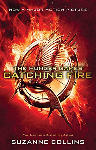 Catching Fire Movie-Tie-in-Edition [Paperback] [Nov 10, 2014] SUZANNE COLLINS (Paperback, 2014, Scholastic India)